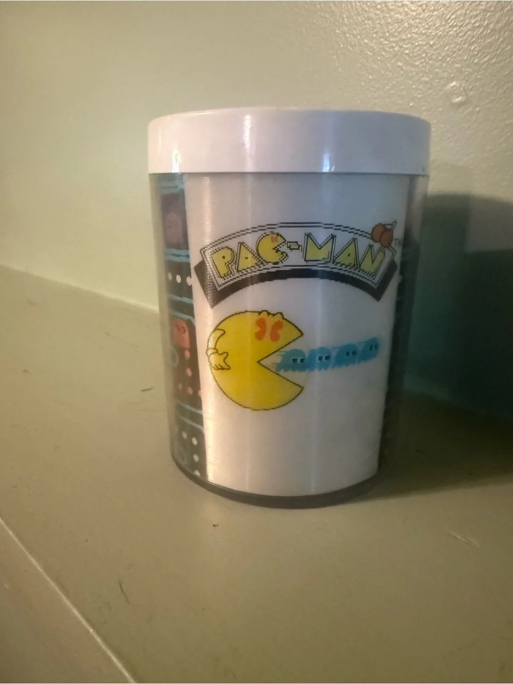 Pac-Man Retro Ceramic Mug in White with Blue & Yellow Graphic